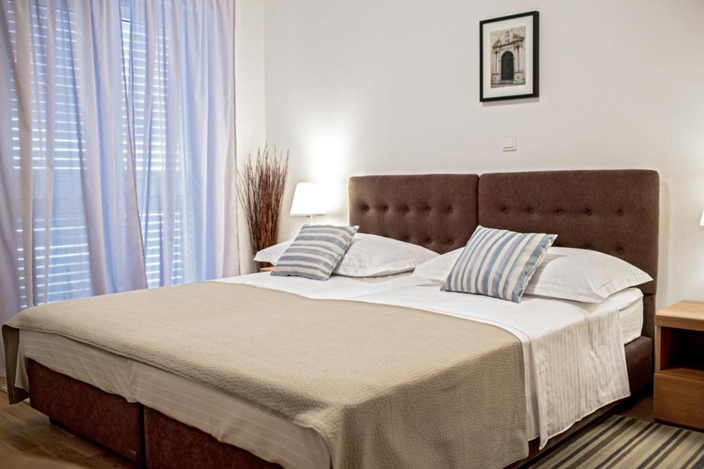 Двухместный (Двухместный номер с 1 кроватью или 2 отдельными кроватями и балконом) гостевого дома Rooms Margarita, Сплит