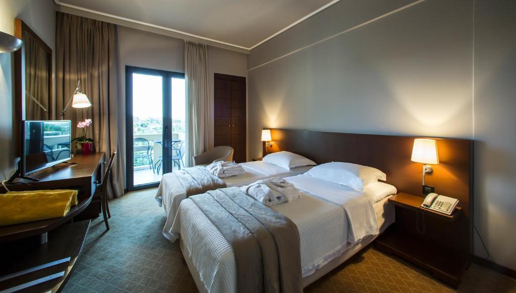 Двухместный (Стандартный двухместный номер с 1 кроватью или 2 отдельными кроватями) отеля Dekelia Hotel, Афины