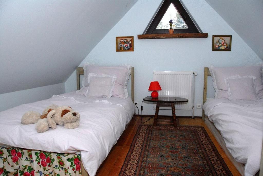 Двухместный (Двухместный номер с 1 кроватью или 2 отдельными кроватями, общая ванная комната) семейного отеля Rezydencja Święty Spokój, Висла