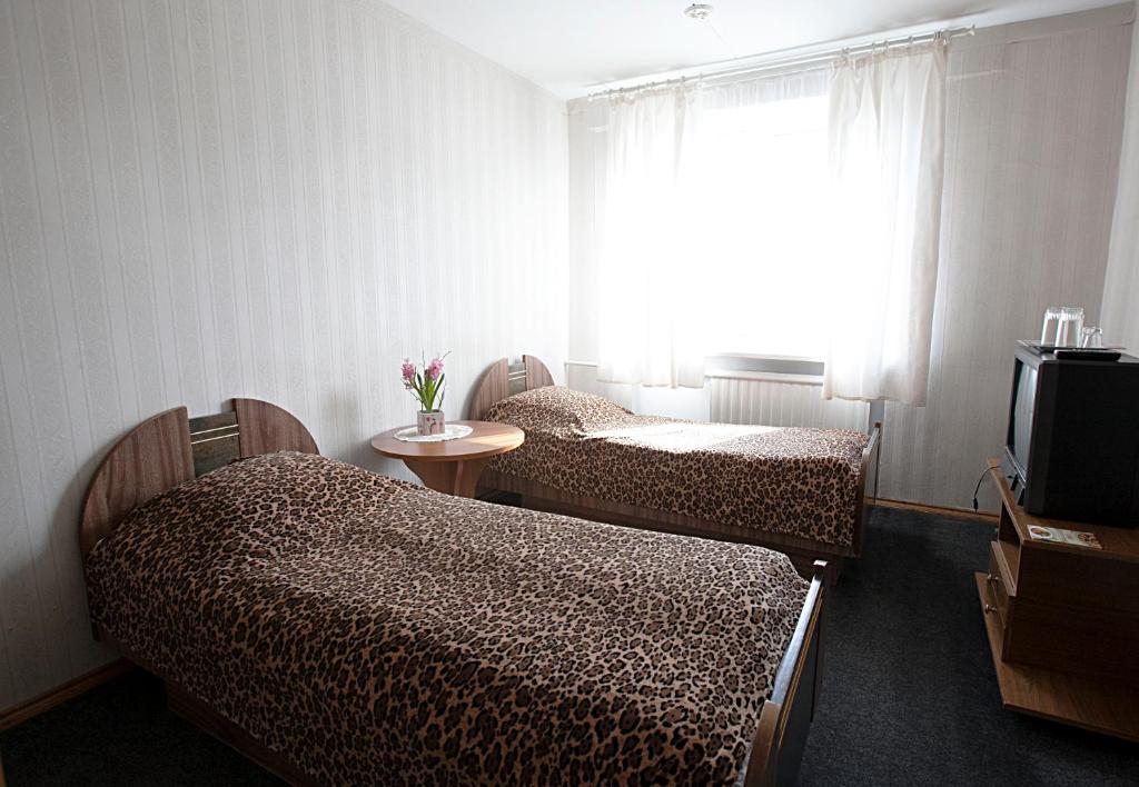 Двухместный (Стандартный двухместный номер с 2 отдельными кроватями) гостевого дома Fortūna Guest House, Клайпеда