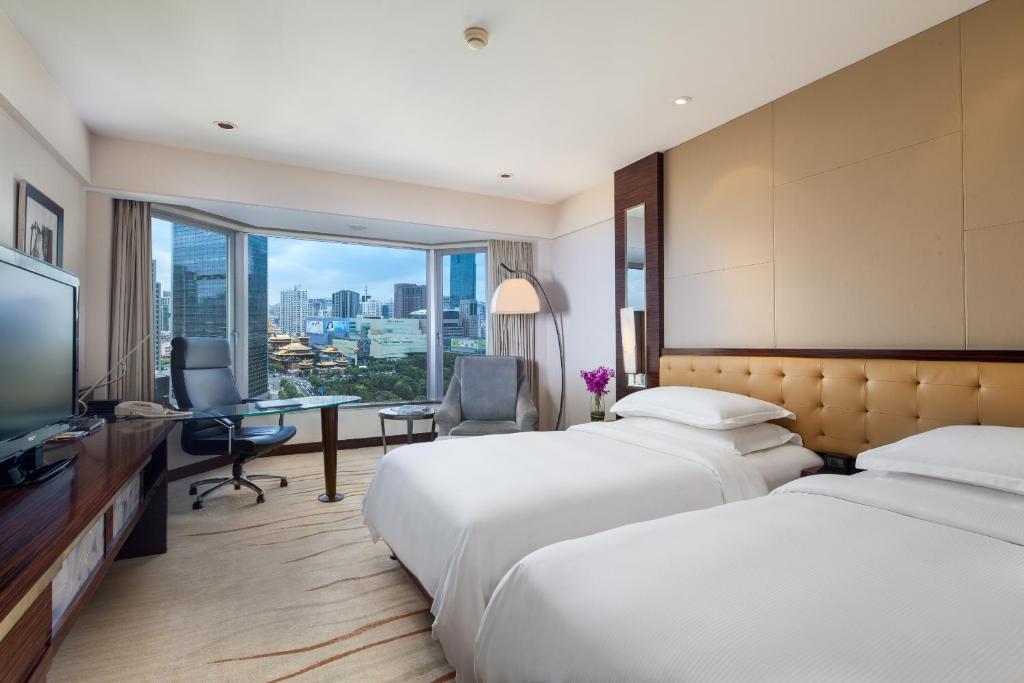 Двухместный (Двухместный номер Делюкс с 2 отдельными кроватями) отеля Hilton Shanghai, Шанхай