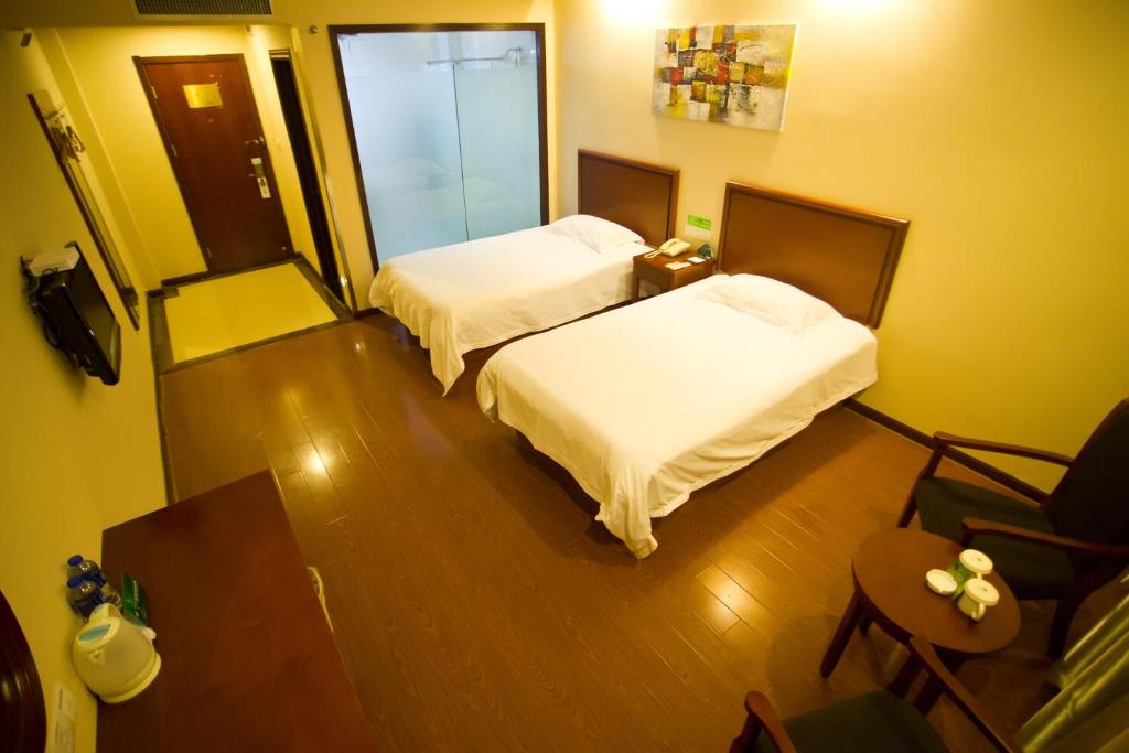Двухместный (Для граждан материкового Китая - Двухместный номер Делюкс с 2 отдельными кроватями) отеля GreenTree Inn Shanghai Meilan Lake Hutai Road Express Hotel, Баошань