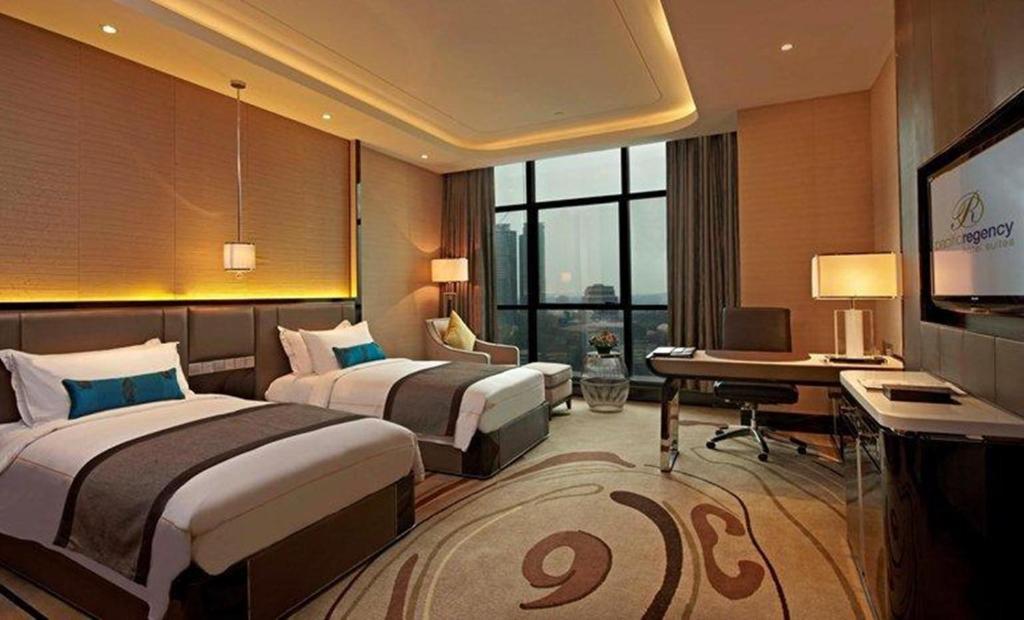 Сьюит (Представительский двухместный люкс «Премьер» с 2 отдельными кроватями) отеля Pacific Regency Hotel Suites, Куала-Лумпур