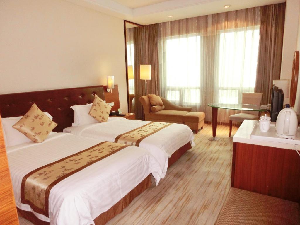 Двухместный (Двухместный номер Делюкс с 2 отдельными кроватями) отеля Ramada Plaza Guangzhou, Гуанчжоу