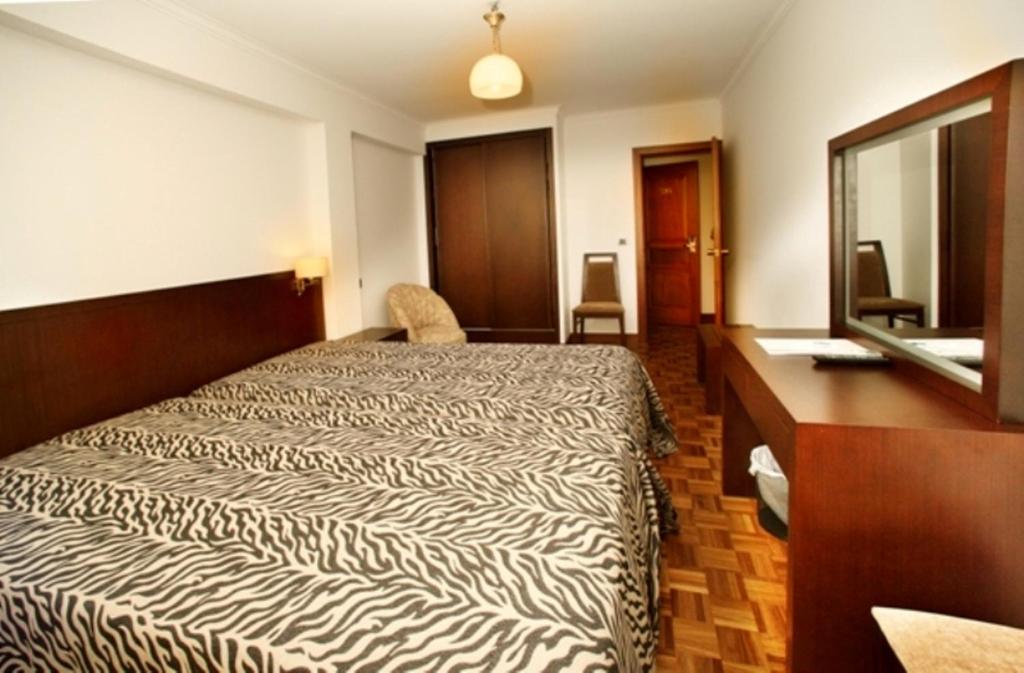 Двухместный (Двухместный номер с 1 кроватью или 2 отдельными кроватями) отеля Hotel Mira Rio, Эшпозенди