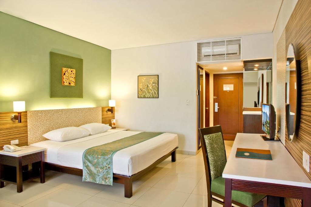 Двухместный (Двухместный номер Делюкс с 1 кроватью или 2 отдельными кроватями) отеля Bali Rani Hotel, Кута