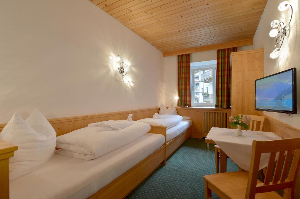 Двухместный (Двухместный номер с 2 отдельными кроватями) отеля Posthotel Mayrhofen, Майрхофен