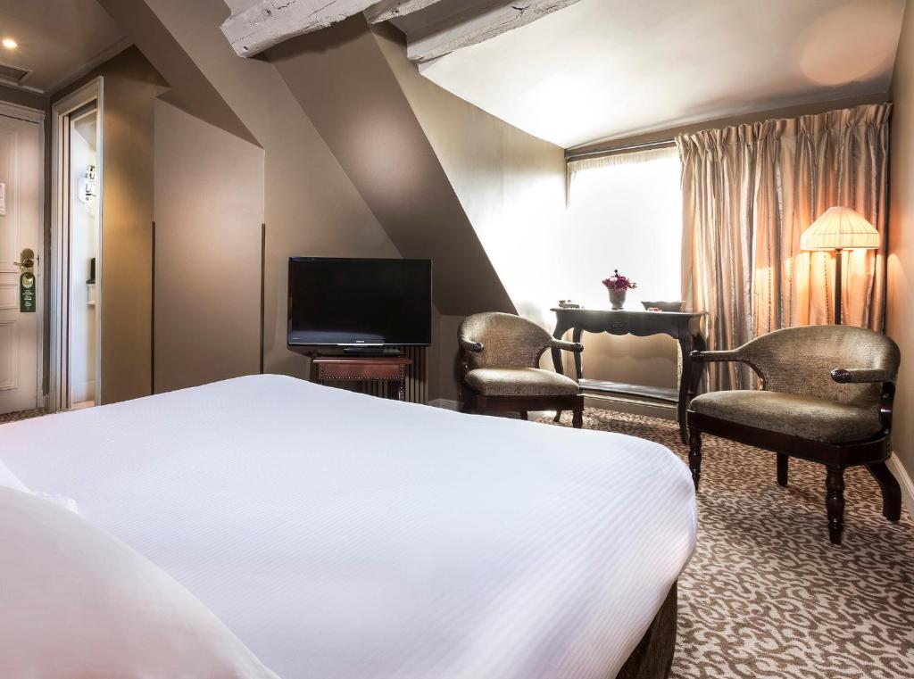 Двухместный (Представительский двухместный номер с 1 кроватью) отеля Hotel Odeon Saint-Germain, Париж