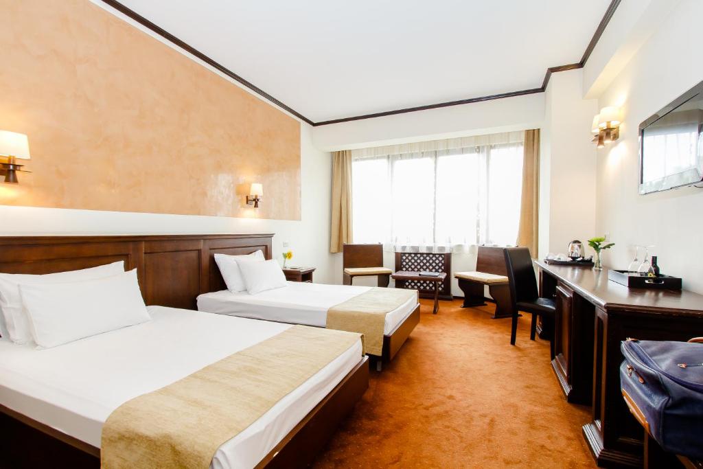 Двухместный (Стандартный двухместный номер с 2 отдельными кроватями) отеля International Bucharest City Centre Hotel, Бухарест