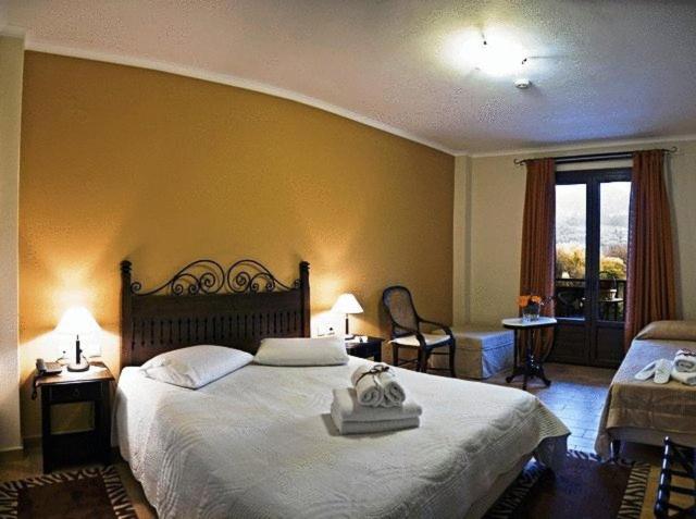 Двухместный (Улучшенный двухместный номер с 1 кроватью или 2 отдельными кроватями) отеля Melegos Inn Hotel, Карпенисион