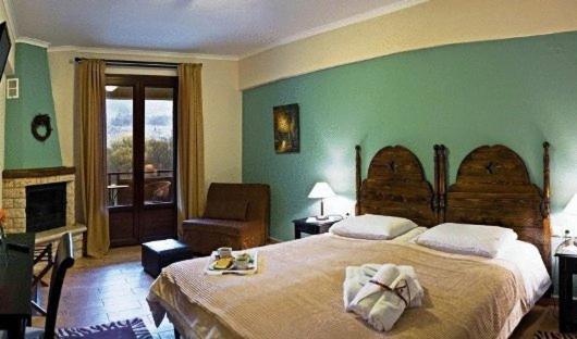 Двухместный (Двухместный номер Делюкс с 1 кроватью или 2 отдельными кроватями и камином) отеля Melegos Inn Hotel, Карпенисион