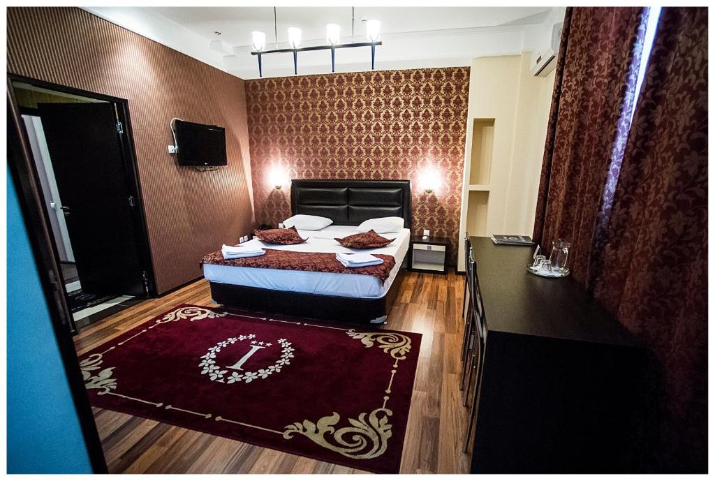Сьюит (Улучшенный двухместный номер с 1 кроватью) отеля Iris, Кишинев