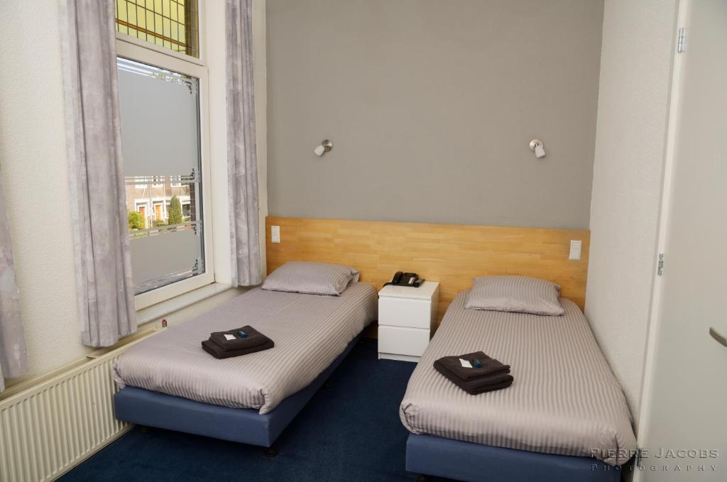 Двухместный (Стандартный двухместный номер с 2 отдельными кроватями) отеля Hotel Villa Margaretha, Гаага