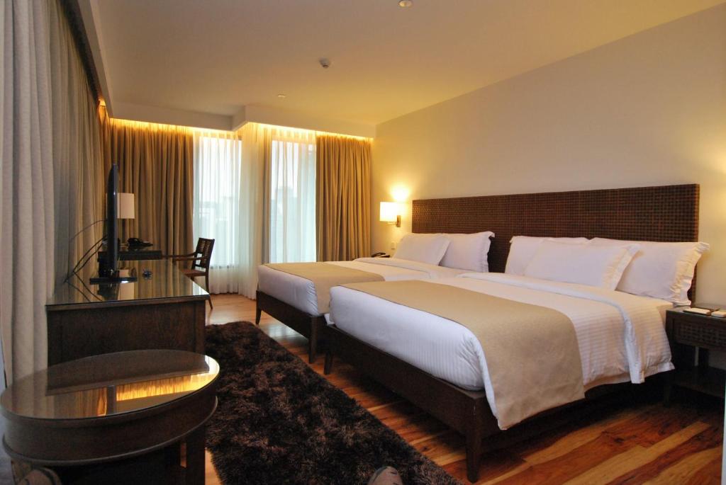 Двухместный (Двухместный номер Делюкс с 2 отдельными кроватями), City Garden Grand Hotel