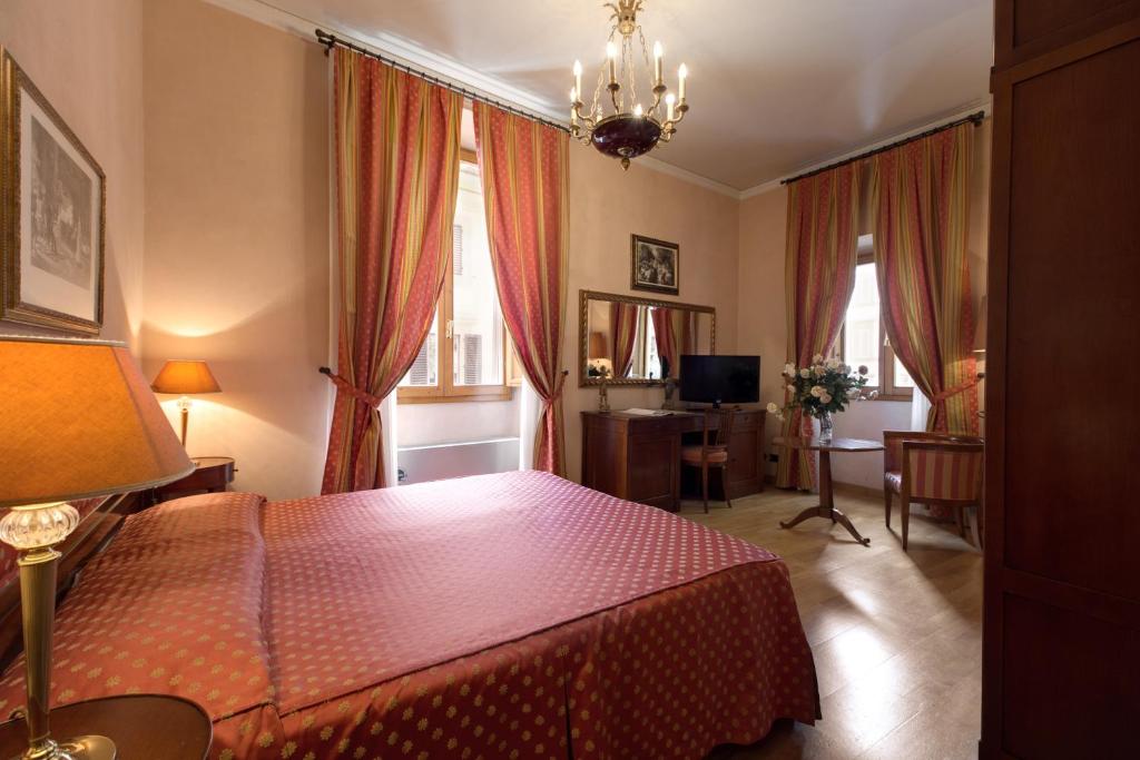 Двухместный (Двухместный номер с 1 кроватью или 2 отдельными кроватями) отеля Hotel Bigallo, Флоренция