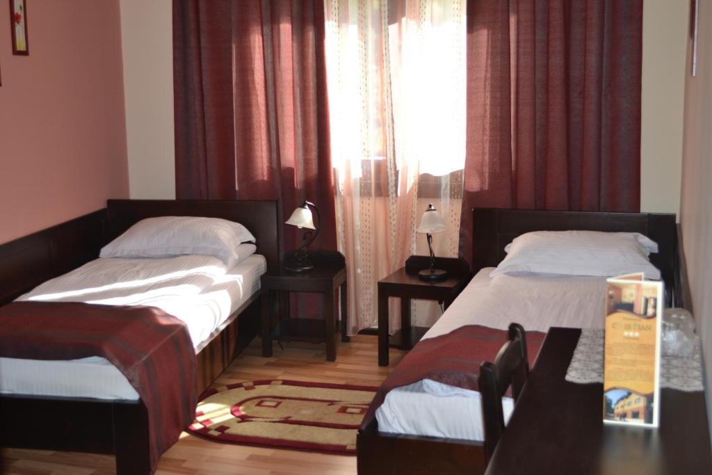 Двухместный (Двухместный номер с 1 кроватью или 2 отдельными кроватями) гостевого дома Pensiunea Cristian Covasna, Ковасна