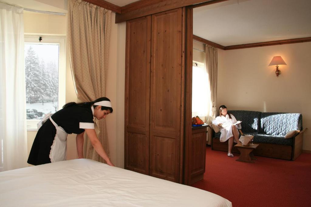 Трехместный (Улучшенный трехместный номер с видом на горы) отеля Hotel Alaska Cortina, Кортина-д'Ампеццо