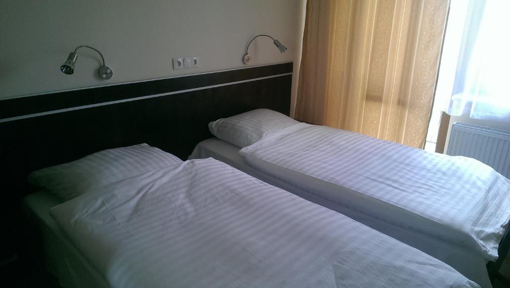 Двухместный (Двухместный номер «Комфорт» с 1 кроватью или 2 отдельными кроватями) отеля Hotel E7, Радом
