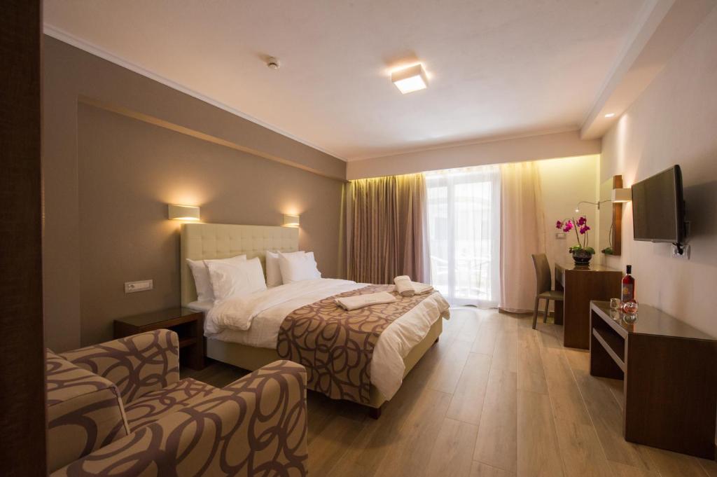 Двухместный (Двухместный номер Делюкс с 1 кроватью или 2 отдельными кроватями) отеля Adams Hotel, Парга