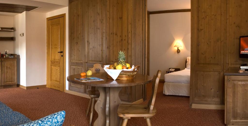 Двухместный (Классический двухместный номер с 1 кроватью или 2 отдельными кроватями) отеля Hotel Alaska Cortina, Кортина-д'Ампеццо