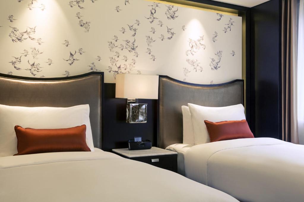 Двухместный (Представительский двухместный номер с 2 отдельными кроватями) отеля Grand Mercure Beijing Dongcheng, Пекин
