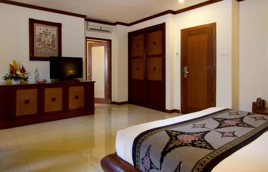 Двухместный (Двухместный номер Делюкс с 1 кроватью или 2 отдельными кроватями, вид на сад) курортного отеля Grand Balisani Suites, Семиньяк