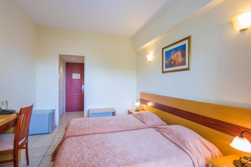 Двухместный (Двухместный номер с 2 отдельными кроватями) отеля CNic Hellinis Hotel, Керкира