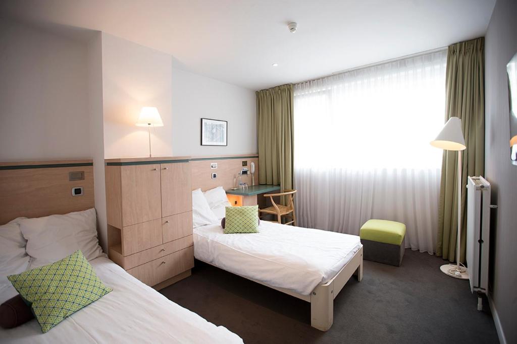 Двухместный (Небольшой двухместный номер с 2 отдельными кроватями) отеля Hotel Van Bunnen, Кнокке-Хейст