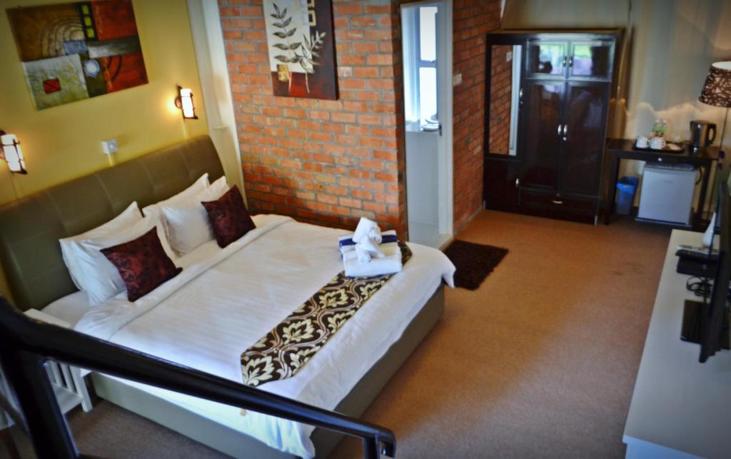 Двухместный (Улучшенный двухместный номер с 1 кроватью и террасой) курортного отеля The Ocean Residence Langkawi, Лангкави