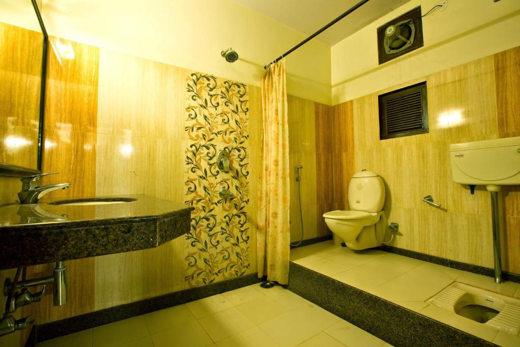 Трехместный (Стандартный трехместный номер с вентилятором) отеля Hotel Kalyan, Джайпур