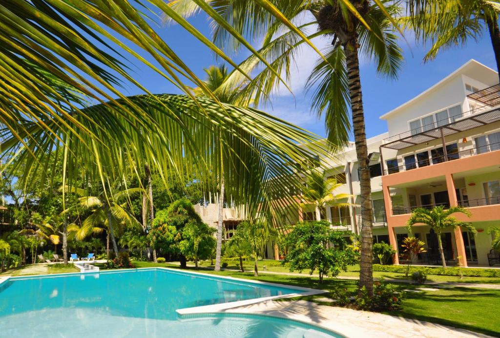 Апартаменты (Апартаменты с 1 спальней, вид на сад) апарт-отеля Infiniti Blu Luxury Ocean Front Condos, Сосуа