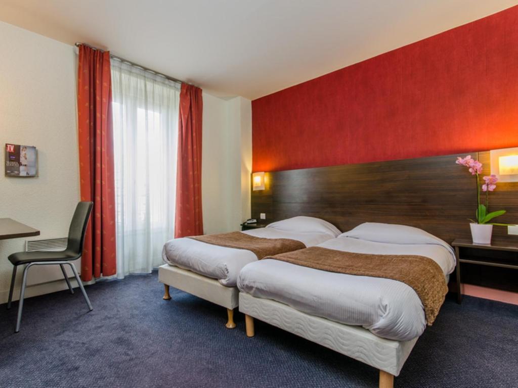 Двухместный (Двухместный номер с 2 отдельными кроватями) отеля Hotel Arc Paris Porte d'Orléans, Париж