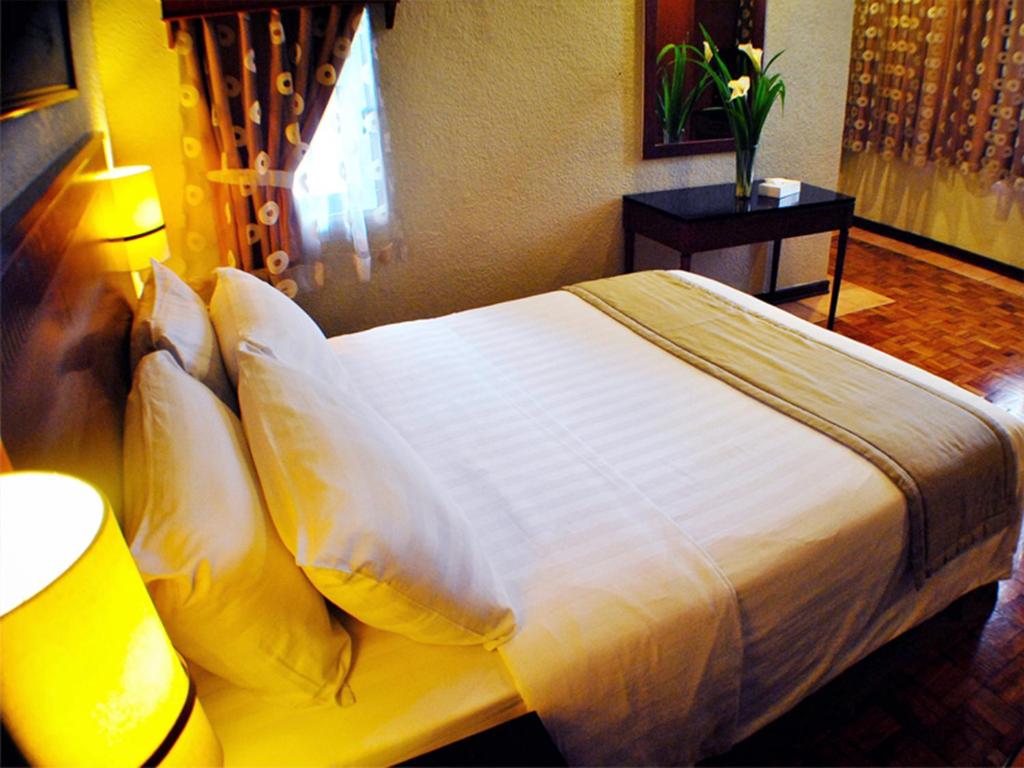 Двухместный (Номер Делюкс с кроватью размера «queen-size») отеля Fersal Hotel - P. Tuazon Cubao, Манила