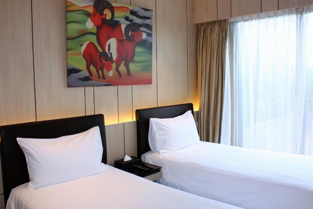 Двухместный (Двухместный номер Делюкс с 2 отдельными кроватями) курортного отеля Noah's Ark Resort, Гонконг (город)