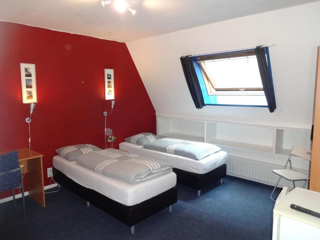 Двухместный (Двухместный номер с 2 отдельными кроватями и общей ванной комнатой) хостела Pension Zevenbergen, Берген-оп-Зом