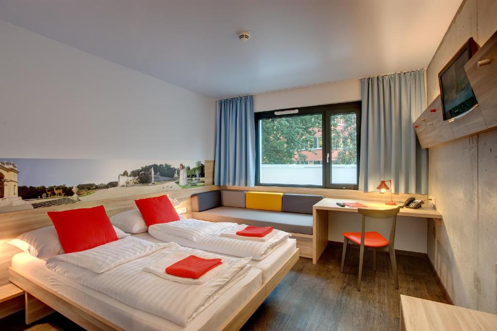 Двухместный (Двухместный номер с 2 отдельными кроватями) отеля MEININGER Hotel Wien Downtown Franz, Вена