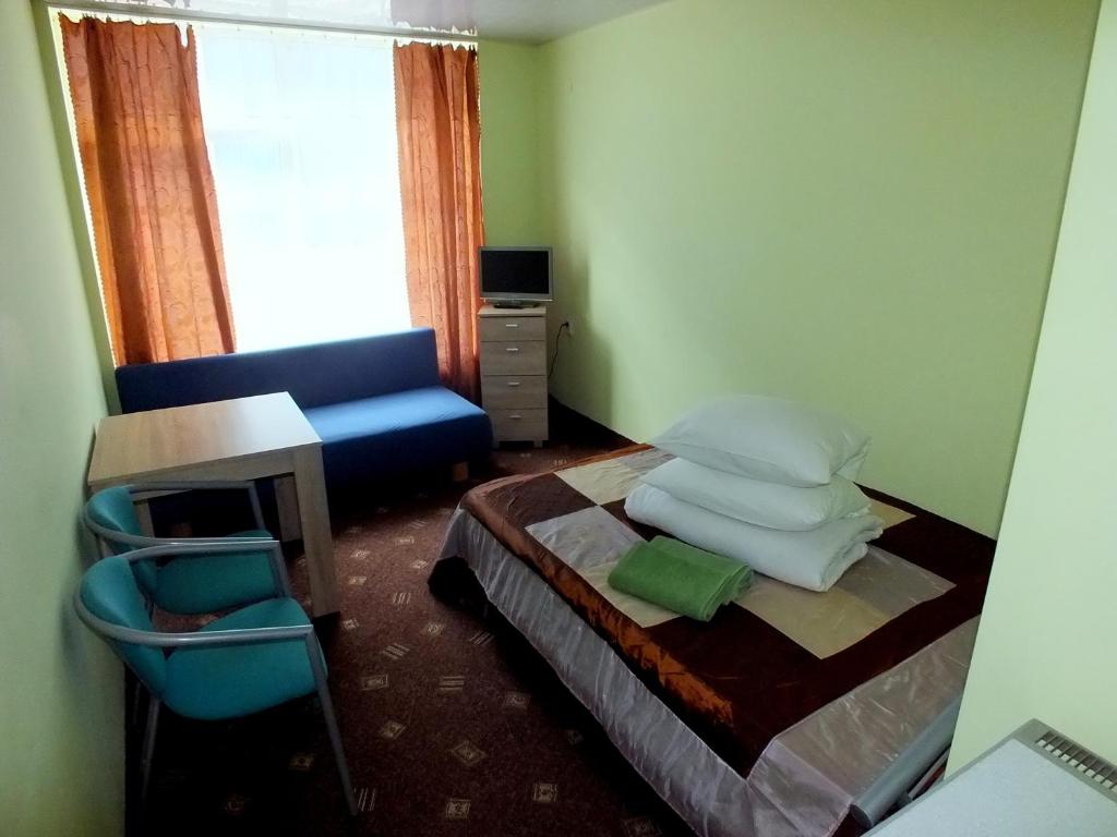 Двухместный (Двухместный номер с 1 кроватью или 2 отдельными кроватями и собственной ванной комнатой) мотеля Motelis Jonučiai, Гарлява