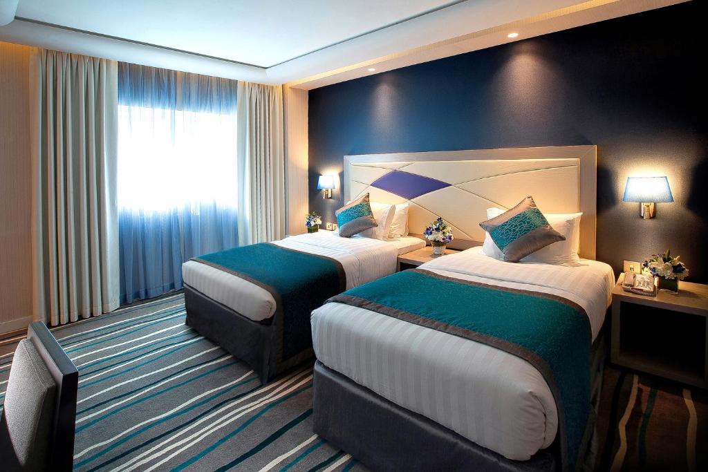 Двухместный (Представительский двухместный номер с 2 отдельными кроватями) отеля Al Sarab Hotel, Дубай