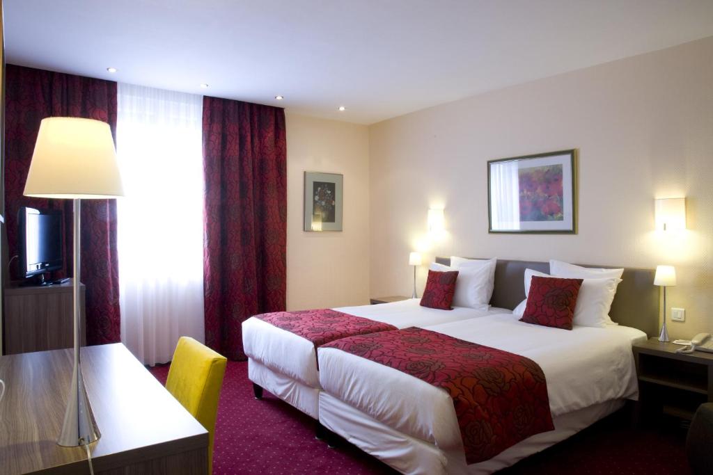 Двухместный (Улучшенный двухместный номер с 2 отдельными кроватями) отеля Best Western Grand Hôtel Bristol, Кольмар