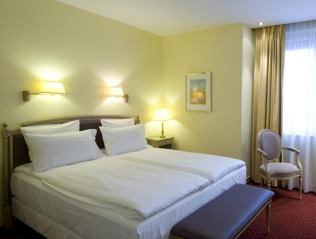 Двухместный (Стандартный двухместный номер с 1 кроватью или 2 отдельными кроватями) отеля Best Western Grand Hôtel Bristol, Кольмар