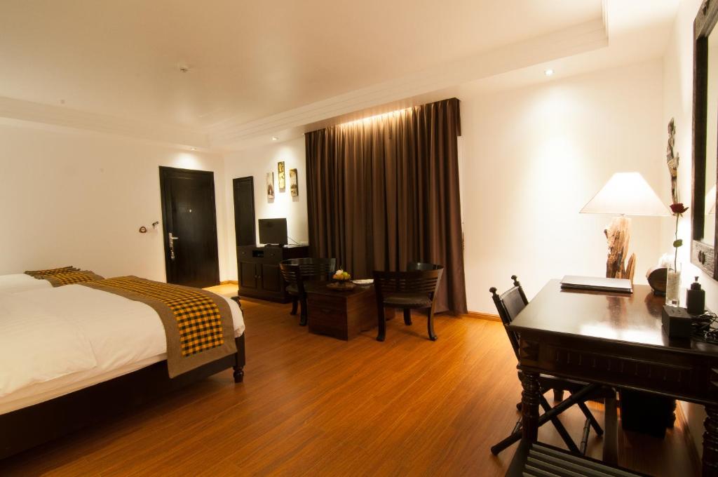 Сьюит (Двухместный полулюкс с 2 отдельными кроватями) отеля La Rose Suites, Пномпень
