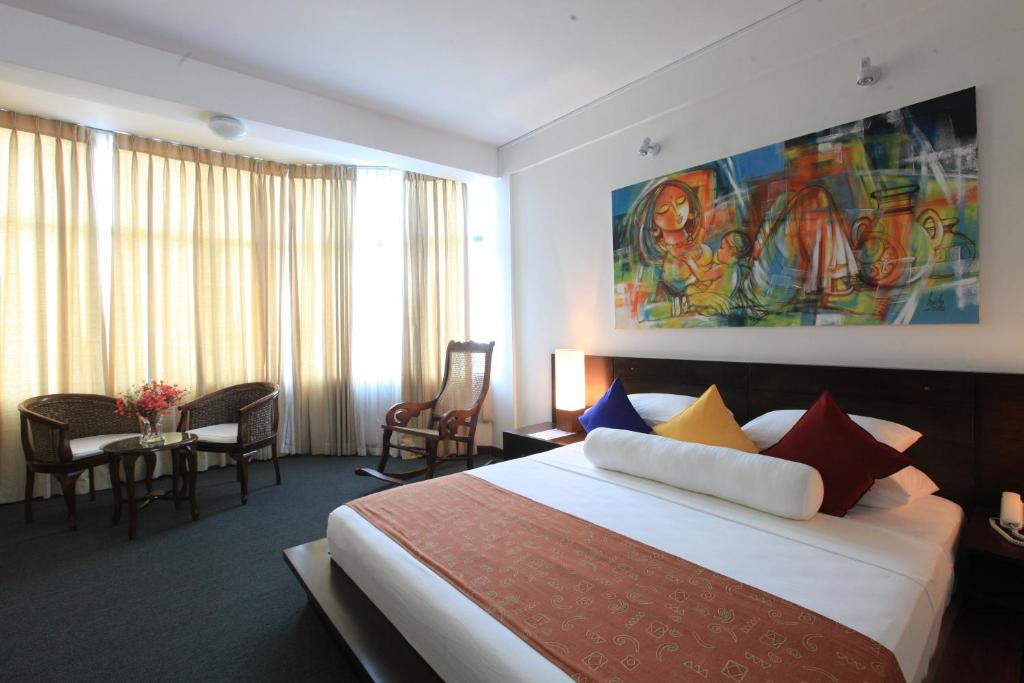 Трехместный (Двухместный номер Делюкс с 1 кроватью) отеля Amaara Sky Hotel Kandy, Канди