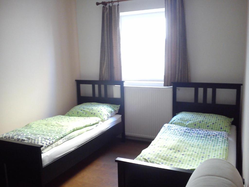 Двухместный (Двухместный номер с 2 отдельными кроватями и дополнительной кроватью) гостевого дома Pitnerka, Густопече
