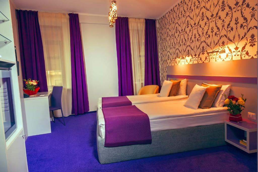 Двухместный (Стандартный двухместный номер с 2 отдельными кроватями) отеля Hotel Trianon, Бухарест