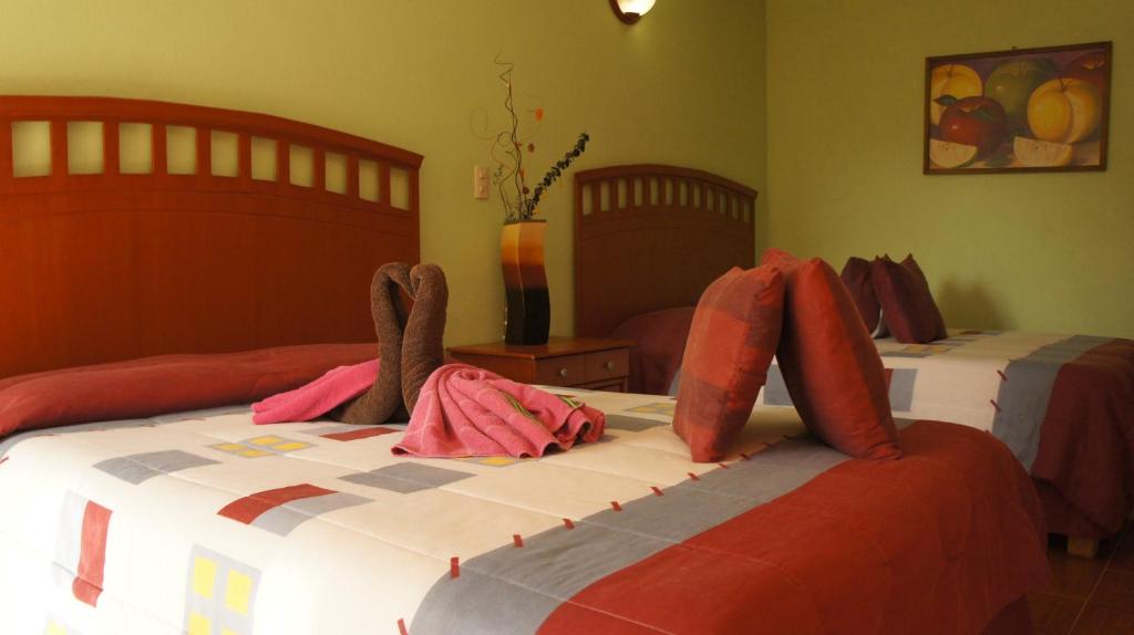 Двухместный (Стандартный двухместный номер с 2 двуспальными кроватями) отеля Hotel Posada Tolteca, Тула-дель-Алленде