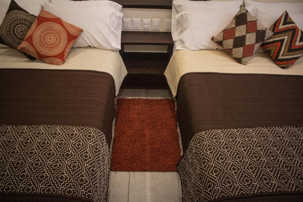 Двухместный (Двухместный номер с 2 двуспальными кроватями) отеля Hotel Mayis, Оахака-де-Хуарес