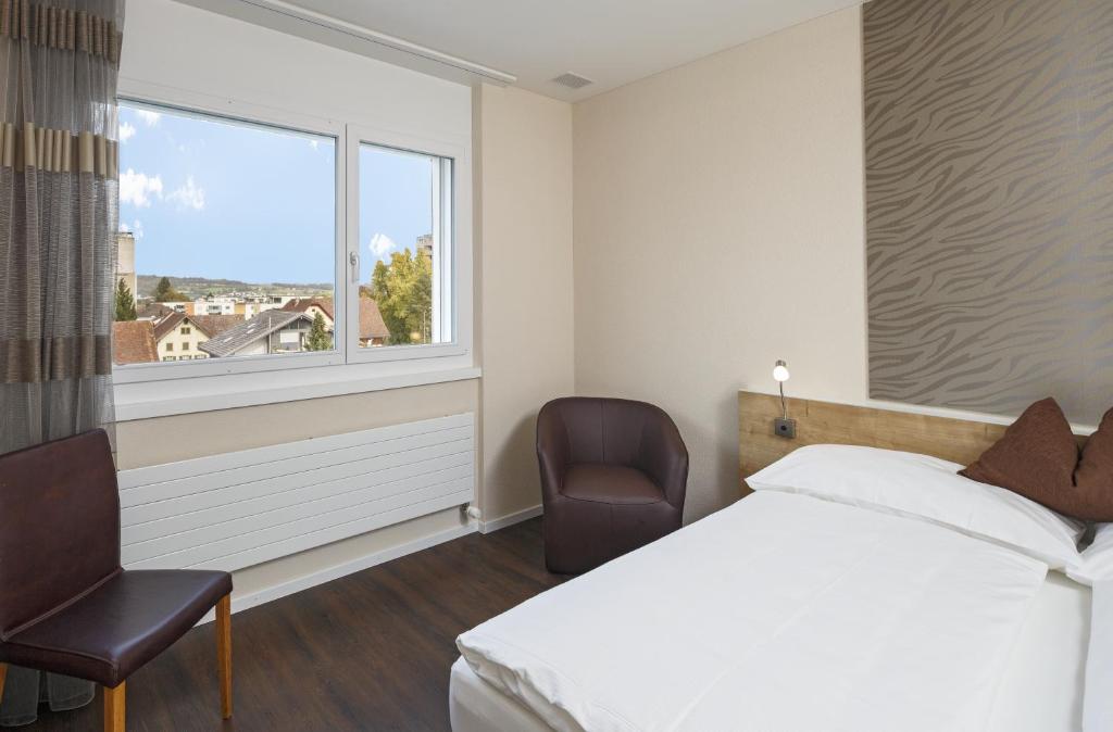 Двухместный (Специальное предложение - Двухместный номер с 2 отдельными кроватями) отеля Villmergen Swiss Quality Hotel, Фильмерген