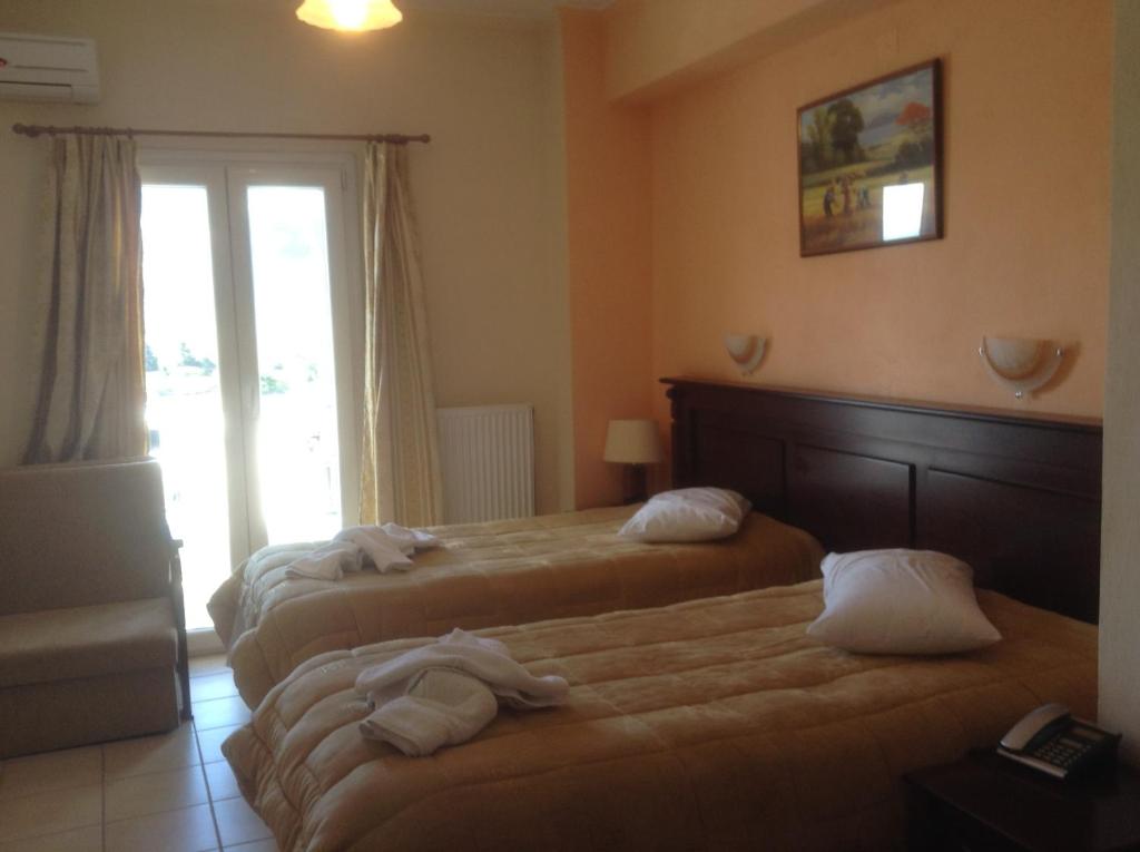 Двухместный (Двухместный номер с 1 кроватью или 2 отдельными кроватями) отеля Hotel Kosta Famissi, Калампака