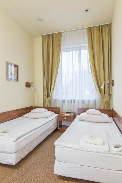 Двухместный (Двухместный номер с 2 отдельными кроватями) отеля Hotel Colibra, Варшава
