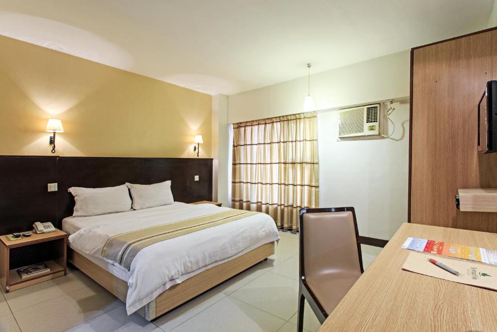 Двухместный (Стандартный двухместный номер с 1 кроватью или 2 отдельными кроватями) отеля The Orchard Cebu Hotel & Suites, Себу